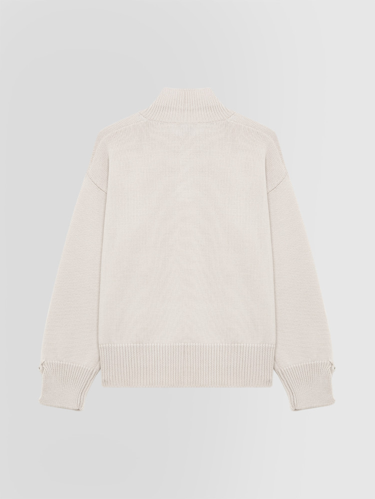 JERSEY DE CUELLO ALTO EN LANA MERINO CON BOTONES